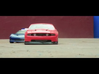 toy car race filmed in the style of hollywood
